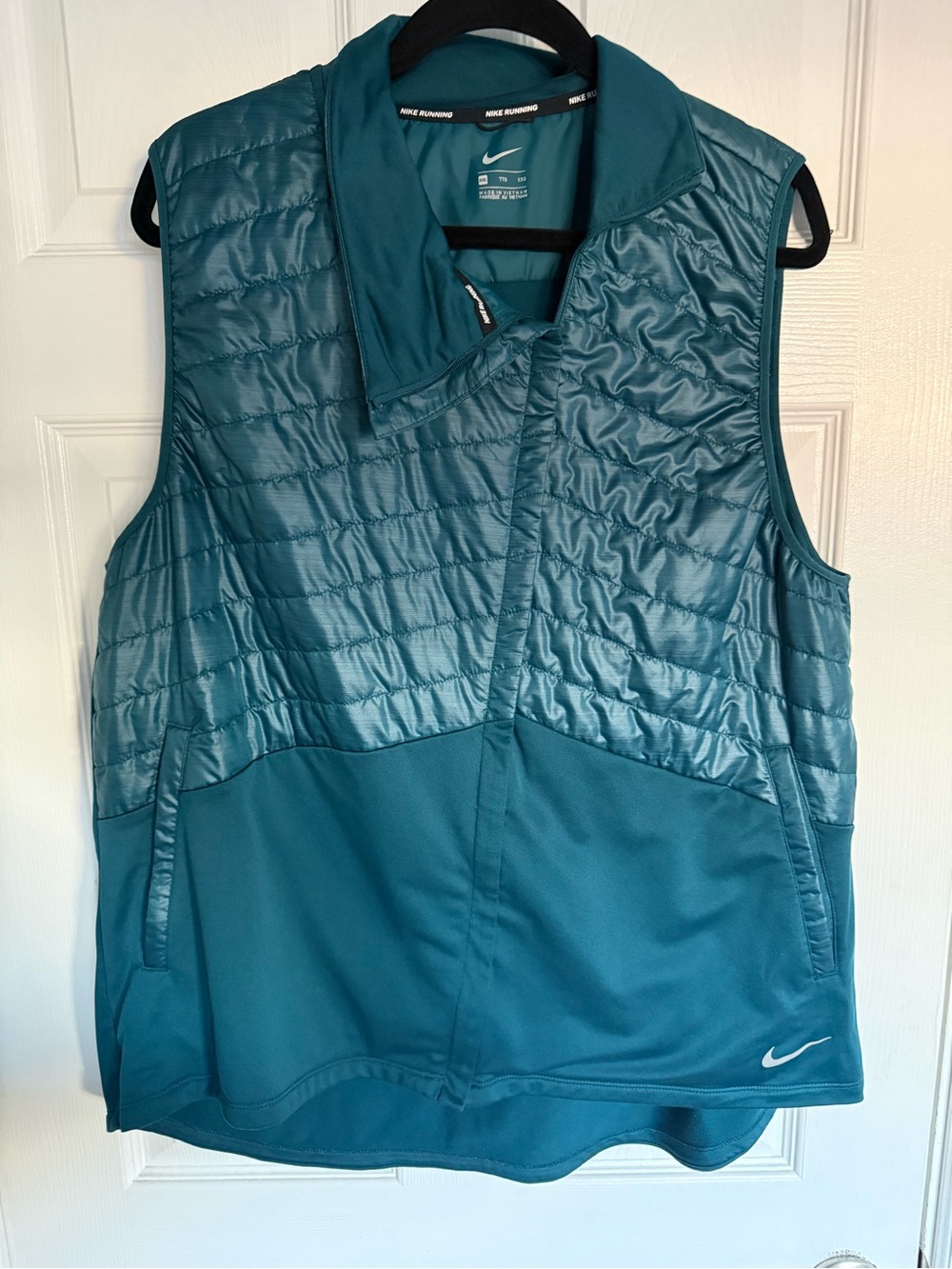 Nike size XXL Women’s Teal Quilted Hybrid Running Vest